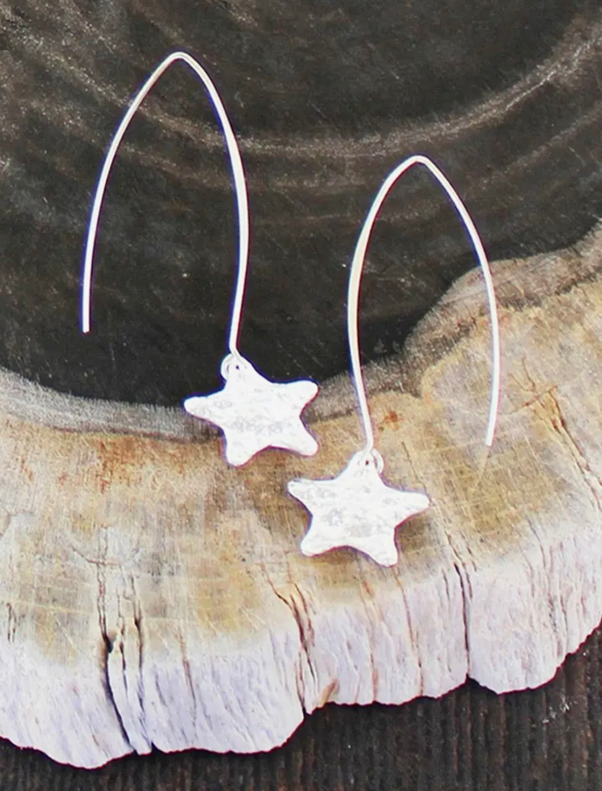 DROP EARRINGS WITH TEXTURED STAR CHARM